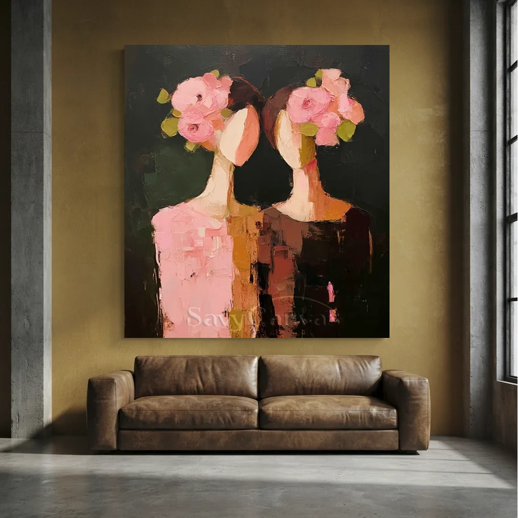 Handcrafted abstract floral oil painting featuring textured pink flowers and portraits against a dark background hanging in a modern living room