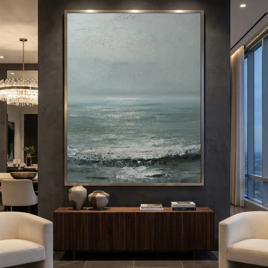 Hand-painted minimalist coastal ocean landscape oil painting featuring heavy impasto white wave textures, mist grey, and muted seafoam green tones for modern wall decor