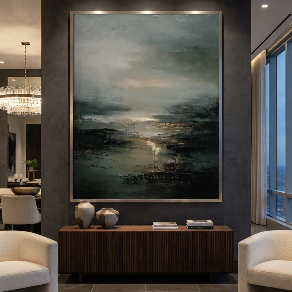 Handmade dark coastal abstract oil painting depicting a hazy shoreline under cloudy skies, painted in deep olive green, charcoal, and subtle golden light reflections with heavy impasto brush textures on canvas.